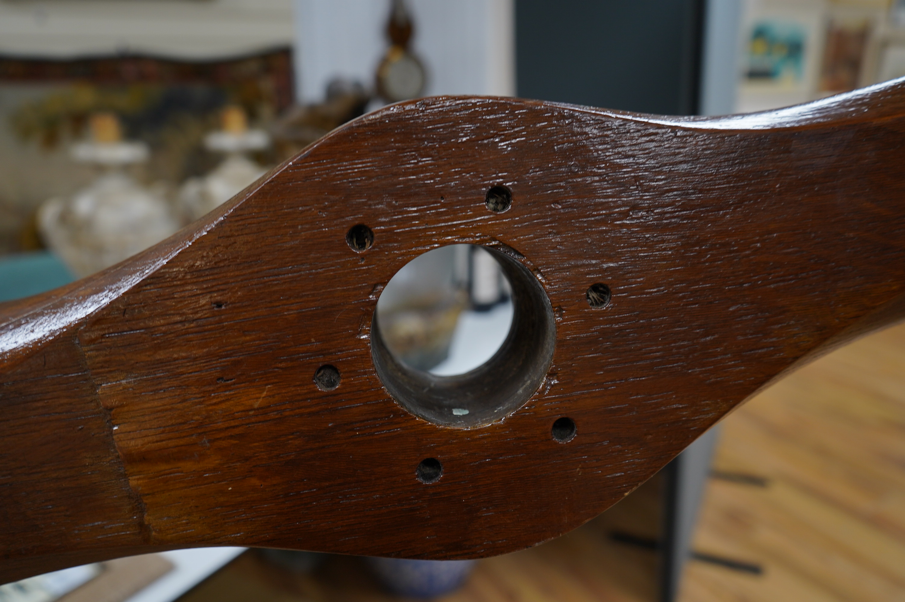 An early 20th century American laminated oak propeller with copper clad blade edges, Paragon stamp to the blade, 251cm wide. Condition - good